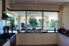 13 Matcham Close Gloucester NSW 2422 Set on a sprawling 4.4 acres of parkland is this imposing 5 bedroom home located within walking distance of Gloucester township. The masterbuilt home reflects space and views throughout it’s design with big windows, high ceilings and well defined living areas. Features of the house include a spacious cook’s kitchen, open fireplace, huge main bedroom and ensuite, private outdoor entertaining area, big double garage and a study or craft room. The rambling yard and garden is low maintenance with plenty of room to play with the dog or practice your putting. This house has been lovingly cared for by the original owners and is only 10 years old. It is located on a quiet road, yet just a short walk to the parks and gardens of Gloucester. The grounds are gently rolling lawns adjoining farmland with sweeping views of the Bucketts Mountains and the Gloucester Valley.