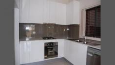 Guildford NSW 2161 Features: very Large bedrooms, Ducted Air Conditioning, Tiled floors, open plan living area, large polyurethane kitchen with gas cooking, dishwasher, ceaser stone bench tops, guest powder room, built in wardrobes in all rooms, ensuite in main bedroom, large main bathroom, easy care court yard, alarm, security intercom, large stret facing balcony, driveway and lock up garage. Torren's Title Duplex Home means that you don't pay Strata!!! Located on a quiet street, close to schools, shops, public transport, day care and leagues club.