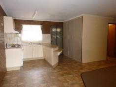 1 & 2/2 MUNGOMERY STREET Childers Qld 4660 For Sale $410,000 * 2 X 2 bedroom units built out of low maintenance Clay Blocks * 1012m2 allotment with room for two more units * Lovely position in town opposite primary school and a short walk to high school & shops * Master bedrooms in both units are air conditioned * Double carport (1 each unit) * Both units are presently tenanted