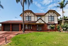 6 Fairhill St Hallett Cove SA 5158 * 2 storey Tudor style 4 bedroom home with ocean views * Block size - 688 sq.m. * Equivalent main area - 225 sq.m. * Downstairs living and upstairs bedrooms * Formal entry * Formal lounge with open fireplace and mantlepiece * Separate TV room * Timber kitchen with dishwasher and attached meals area * Ducted cooling * Intercom system throughout the home * Large covered entertaining area * 4 rainwater tanks * Double garage under main roof with auto door and rear access * Manicured gardens with toolshed