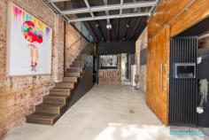 19 Hopewell Street, Paddington, NSW, 2021 "The Garage" Transformed into Sensual Living Having experienced a truly remarkable makeover, "The Garage" has been transformed into a unique three-storey freestanding architectural masterpiece of contemporary design. Sporting custom finishes and interiors throughout, this sleek residence is for those enjoying an active and outgoing cosmopolitan lifestyle. Located just a few minutes' walk from the best cafes, galleries and high end designer shops in Paddington & Darlinghurst, this spectacular abode will provide unparalleled comfort and convenience. Features: - 2 spacious bedrooms, 1 state of the art bathroom, a sundrenched courtyard + garaged parking - Oversized master bedroom with copious amount of storage area and a custom-made Tsar carpet - Spacious sunny courtyard with water feature & travetine tiles - Balcony with glass bi-fold doors offering leafy neighbourhood and Centrepoint Tower views - Fully equipped contemporary gas kitchen with integrated fridge and freezer and state of the art Smeg and Miele appliances - Contemporary bathroom with double shower, double sink & custom cabinetry - Video Intercom System - Internal laundry - Open plan living allowing natural light throughout - State of the art finishes, including custom-made floating stairs, cabinetry and high quality floorboards Position Realty Refreshingly Professional Sales & Property Management Throughout The Eastern Suburbs