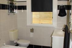 17 William St Millmerran QLD 4357 DETAILS $315,000 Residential Bedrooms: 4 Bathrooms: 2 Garage Spaces: 1 1st Time Opportunity—”The Post Office House” Available For Separate Sale – $315 000 Area: 1010 Square Metres – Renovated Queenslander with character and charm, 4 Bedroom timber home, all b/rs with ceiling fans & built-in storage, main b/r has ensuite & opens onto verandah, 2nd b/r has large w.i.r.. Large formal lounge room with fire place & ceiling fan, stylish main bathroom with shower over bath, toilet & vanity, wide hallway, wide polished original timber floorboards throughout, office, laundry with plenty of storage space, front verandah with northern aspect, single garage, under cover outdoor living area, cubby house, garden shed, established gardens, fenced yard. Only minutes to walk to the Main Street & all town amenities. Backyard access to Bowls Club