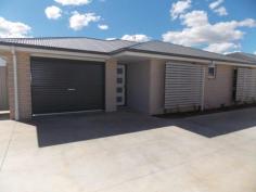 28 Skewis St Chinchilla QLD 4413 3 x brand new 3 bedroom brick units in a complex of three Beautiful Modern open plan kitchen with quality appliances, finishes & walk in pantry. Large open plan living area which opens out onto the private back patio. 3 good size bedrooms each with their own ensuites, TV points, ceiling fans & built in wardrobes. Separate powder room Fully ducted air conditioning through out. Quality carpet to the bedrooms & tiles to the rest of the unit. Private courtyard Single garage plus car park Only a short distance to the centre of town and would be ideal for workers.