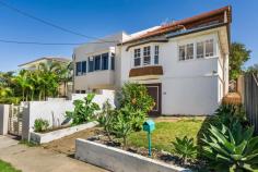 63 The Corso Maroubra NSW 2035 Located close to Jack Vanny Memorial Park this enormous semi is the perfect home for a growing family. With over two hundred square meters of internal space, accommodation can be organised to suit the needs of individual families. The main entrance hall leads to the lounge that opens into the dining room positioned next to the kitchen. The modern kitchen includes granite bench tops, a gas stove top and stainless steel appliances. Adjacent to the dining room is a bathroom and study (or fifth bedroom) that opens onto the rear yard. The room to the north of the entrance can be used as a family room or bedroom and includes an attached sunroom. The upper level consists of three bedrooms and main bathroom. The master bedroom includes a walk-in-robe and takes advantage of coastal and ocean views to the north. Features of the building include polished timber floors, ornate ceilings, and bay windows. A laundry and garden shed are positioned in the rear yard and the property is secured with an integrated security alarm system. The garage is situated on the lower level. Large areas for storage are also positioned under the house. The Corso is a quiet street. Maroubra Beach can be access via a ten minute walk through the park and the Mahon Ocean Pool is within 200 meters of the front door. Transport routes and café’s are located nearby.