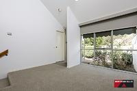 3 Cornish Place Holder ACT 2611 Separate Title Willemsen This separate title three bedroom ensuite townhouse is located in a quiet cul-de-sac within a short stroll of the Holder shops. It was designed by local architect Gary Willemsen and features a contemporary design incorporating the clever use of different levels and large picture windows that allow the natural north-easterly light to fill the rooms. This property is ready for the new owners to enjoy from day one with new carpet, a fresh coat of paint, a brand new kitchen and updated bathrooms. The living areas face into the two paved private courtyard gardens that provide your own secluded entertaining areas. The main bedroom with ensuite is separated from the other two and is located on the ground floor with a garden outlook. Upstairs the second and third bedrooms that share a bathroom. On this level there is also a study area overlooking the dining room. There is ample storage area in the attic space. The double carport could easily be enclosed for added security for your vehicles. This stunning property will appeal to many so don't delay your inspection. House size: 119sqm Rates: $1,703.37pa approx Land Tax: $3,119.46pa approx General Features Property Type: Townhouse Bedrooms: 3 Bathrooms: 2 Building Size: 119.00 m² (13 squares) approx Outdoor Features Carport Spaces: 2 Eco Friendly Features EER (Energy Efficiency Rating): Low (1.5) $495,000