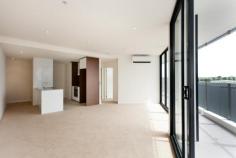 301/1 Mouat Street, LYNEHAM ACT 2602 $335,000 If you are looking for a great investment property or a stylish first home then this apartment may be perfect for you. On offer here is a great location. The Dickson shops and Southwell Park are within footsteps, while the City and CBD are a short drive away down Northbourne Avenue. This particular apartment is in a premier position within Axis. It is on floor eight of eleven, has great views over the surrounding suburbs and playing fields of Dickson and offers a 16 sq m wrap-around balcony that spans the full glass front of the apartment.