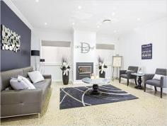 Elizabeth Hills NSW 2171 A great opportunity to purchase this unique, young & modern residence with quality inclusions located in popular Elizabeth Hills estate which can be suitable for 2 families or be an investors dream. 5 Large bedrooms with built ins His & hers walk-in-robe to main with balcony overlooking lovely parklands. 2 ensuites (main bedroom & ensuite in bedroom downstairs) Formal lounge, dining & family rooms Polyurethane kitchen with 40mm Caesar stone bench-tops, mirrored splash back, Miele appliances ( in-built microwave, oven and gas cook tops) with dishwasher, plenty of cupboard/storage space + butler's pantry Tiled alfresco/entertaining area outback overlooking in-ground salt water pool Quality bathrooms throughout tiled to ceilings, freestanding bath tubs with semi frame-less glass shower screens Remote controlled double lock-up garage with internal access Ducted air-conditioning, ducted vacuum and down lights Alarm & intercom system with cctv Built-in gas fireplace Polished concrete flooring throughout living areas
