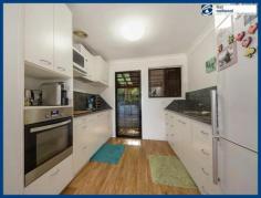 2/77 Railway Street, MUDGEERABA QLD 4213 Located privately, yet right in the centre of Mudgeeraba, this two
bedroom single level very tidy villa enjoys elevated views and is
located in a small complex in a bush setting. Features include: * 2 bedrooms * 1 bathroom * Open plan living with split system air-con & ceiling fan * Modern white galley kitchen * Easy care timber-look flooring through-out * Large rear covered courtyard * Covered off-street parking for one vehicle You'll
love the convenience of being only a minute or two's walk from Coles
and the Mudgeeraba Village Shopping Centre and just a few minutes drive
to the M1 Motorway, Robina Hospital, Railway and Robina Town Centre
Shopping. All this and the fact that single level &
pet-friendly villas are highly sought-afer means this could be your
perfect first home or investment (with a rental potential of $320 pw) -
great buying that won't last long!