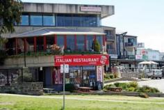 31 Kosciuszko Rd Jindabyne NSW 2627 Located
in the Jindabyne Town Centre, with fabulous views over Lake Jindabyne,
Angie's Italian kitchen has built a reputation for the quality of its
Italian cuisine, pizza, and coffee, and as an award-winning eating spot
in the centre of Jindabyne. Angie's, licensed to seat
ninety-five, operates for six weeks over the Christmas holiday period,
four nights per week from Easter to the June long weekend, and seven
nights and four lunches a week during winter. There is an immediate
opportunity to increase turnover by introducing additional trading
times. The dining area, with large windows overlooking the lake,
table service, liquor licence, quality menu, commercial kitchen,
abundant parking and central location, provides the total hospitality
package. Angie's Italian Kitchen was established 21 years ago by
the current owners. The current proprietors will provide training to
the new owners in the preparation and cooking of their trademark
products. The new owners will also be given the benefit of the knowledge
gained by the proprietors in their 21 years of successfully running the
business. Businesses with this reputation and location are
rare, so take this opportunity to obtain a very well established and
profitable business in a desirable and sought-after location: Jindabyne.
The premises are also available for purchase by negotiation.