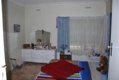 11 Moore St Katamatite VIC 3649 $160,000 This appealing 3 BR WB home is sited on a large 1/2 block in a great location. Features open plan living. Three bedrooms, two with BIR's. Two bathrooms. Solid fuel heater and evaporative cooling. Rewired just last year. Full lock-up garage and garden sheds. Well fenced yard with all the room you will need.