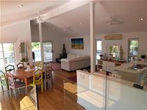 32 Mitchell Street South Mission Beach QLD 4852 Vacation, Vacation, Vacation All successful holiday homes have one thing in common….location, location, location! And you will feel as though you are on R&R as soon as you cross the threshold! This stunning multi-level home will have you unpacking your bags in moments. Constructed over multi levels, this contemporary beach house is bathed in natural light and finished in light and neutral colours to highlight the beautiful Coral Sea and Dunk Island views. The street frontage is deceptive and reveals only the high clearance boat and carports. More is unveiled as you wander up the driveway where an additional 2 boat or car spaces are overshadowed by the fantastic pool area complete with bbq pavilion and bathroom. The home is air conditioned yet natural air flow via louvres and expansive sliding doors to decks and pool areas, will ensure the power bills are low. The central level is dedicated to open plan living, a gourmet kitchen and wide deck where the views are truly tantalising. All this and you are one street back from the beachfront. Let the pictures tell the story and contact marketing agent Melissa Thurgood for further information and to schedule General Features Property Type: House Bedrooms: 3 Bathrooms: 3 Land Size: 969 m² (approx) Price per m²: $717 Indoor Features Toilets: 3 Air Conditioning Outdoor Features Garage Spaces: 4 Swimming Pool - Inground Other Features Built-In Wardrobes,Garden,Polished Timber Floor,Terrace/Balcony