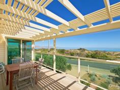 260 Esplanade Aldinga Beach SA 5173 What a perfect location overlooking Silver Sands Beach with views to the headland and beyond. Close
to a stairway that leads down onto the beach and to a walkway across
the sand dune to the sea. Also close to vehicle access and the Surf
Club.
Proudly positioned on a fabulous 1220 sqm block with a garden
designed to be low maintenance and to blend in with the vegetation of
the nearby Aldinga Scrub.
The upper level of this beautiful home features an open plan living
and dining area with a stunning vaulted ceiling and access to balconies
front and back. The kitchen is also on this level, along with two
bedrooms that both offer balcony access. Both have built-in wardrobes
and the large master suite includes a bathroom.
Two more bedrooms with built-ins are located downstairs, along with a combined laundry/bathroom.
A second spacious living room leads out to a paved and covered
entertaining area and then onto the delightful garden with seating areas
shaded by native trees.
Still referred to as "The Boat Shed", the lined and insulated
free-standing rumpus room is a real bonus when friends and family come
to visit. Fitted with cupboards, it makes an ideal spare bedroom and/or
games room.
The single garage under main roof has a panel lift door at each end.
Whether you are looking for a quality built holiday house or a
permanent residence along the Lower Esplanade, this is a "must see".
