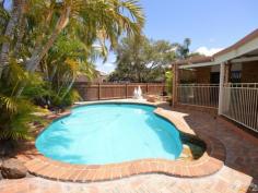 5 Murphy Ct Avenell Heights QLD 4670 $429,000 This four bedroom executive family home has all the extras, with
separate sunken lounge and soaring raked ceilings, both formal dining
and meals area.
A new dream kitchen with an abundance of cupboard and pantry space,
is serviced by electric hot plates, wall oven, dishwasher, plumbed in
refrigerator and a convenient servery to the outdoor area.
Light tiles are predominant throughout the home and there are
several brick feature walls. The home is also fully air-conditioned for
the upcoming warmer Summer months. A spacious family/theatre room is the
ideal place for your guests and comes with built-in bar facilities.
For peace and quiet an enclosed informal retreat overlooks the
gardens below. The bathroom is sparkling with separate shower, gleaming
two seat spa bath and vanity. The master bedroom has an abundant of walk
through cupboards leading to the ensuite.
A huge covered and paved outdoor entertainment area overlooks the
fully fenced concrete saltwater pool and makes for plenty of family fun.
Lush, low maintenance landscaped gardens creates an inviting welcome to
the home.
Solar power system (20 panels) to save or pay no electricity bills.
Supermarket, butcher, baker & wine cellars are a leisurely stroll and schools both private and public are but minutes away.