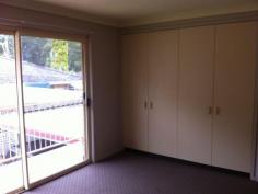 6/125 Rous Road, Goonellabah NSW 2480 With park opposite and Goonellabah Shopping Center nearby this well maintained unit will suit a variety of buyers. Downstairs is a functional kitchen, living area, laundry, second toilet, and single lockup garage with internal access. Three bedrooms upstairs all with built-ins and balcony off main, bathroom and separate toilet. Level yard with carport for additional parking.