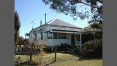 2 Oconnell Street Allora QLD 4362 Country Style Living with Additional Income This comfortable country home is situated 5 mins out of the small township of Allora, 45 mins from Toowoomba & 25 mins to Warwick city centre. The home comes complete with both electric and wood stoves to the kitchen, lounge with a freestanding fire-place, 3 generous bedrooms, 4 car accommodation, lovely country/cottage style gardens, timber patio & alfresco area. There is a separate games room/sleep out with reverse cycle air conditioning and small pot-belly stove. The property is set on 4 titles with the house on the main title, the Games room on another title and the remaining 2 titles have 80 established olive trees, which produced 1 1/2 Ton of olives last year (approximately 200 litres of olive oil). There is also no shortage of water with a bore and tank water situated on the property. This is ideal for those who are looking for the country lifestyle with little maintenance & effort required to earn extra income. General Features Property Type: House Bedrooms: 3 Bathrooms: 1 Land Size: 0.43ha (1.07 acres) (approx) Price per acre: $279,439 Indoor Features Toilets: 1 Air Conditioning Outdoor Features Carport Spaces: 2 Other Features Fireplace(s),Garden