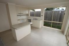1/378 Rossiter Road Koo Wee Rup VIC 3981 INVESTORS TAKE NOTE! An exciting new package perfect for low maintenance living. 2 bedrooms with single garage. Features include island bench top, electric cooking, dishwasher, reverse cycle split system, semi ensuite, remote garage, garden shed and water tank. Walking distance to schools & shops. (Currently Tenanted $996PCM until 5/10/2013) General Features Property Type: House Bedrooms: 2 Bathrooms: 1 Land Size: 173 m² (approx) Indoor Features Built-in Wardrobes Dishwasher Outdoor Features Remote Garage Garage Spaces: 1 Courtyard Shed Fully Fenced