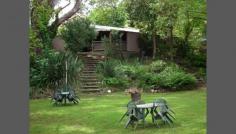 6852 Great Alpine Rd Porepunkah VIC 3740 Lifestyle And Income Opportunity Presenting three bedroom home and 8 self- contained holiday units on approx. 5000 square metres of land on the Ovens River in a truly beautiful part of Victoria just minutes from the beautiful village of Bright. For the owner there is a very comfortable three bedroom home featuring electric kitchen with dishwasher, separate lounge, two toilets, two garages with truly beautiful surroundings. For the guests there are 8 holiday units, swimming pool, entertainment/games area with pool table, bbq facilities and magnificent grounds leading to the Ovens River just perfect for the family holiday. Porepunkah and Bright are very popular year round tourist destinations and gateway to the Victorian Alpine Region and Snowfields just 2 hours from Melbourne. With fully self-contained units guests look after themselves and this venture is easily run by husband and wife couple providing income supplement but with plenty of free time in a completely relaxed environment.