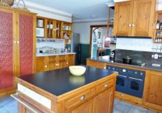 144-148 Stony Rise Rd Stony Rise TAS 7310 This beautifully presented three bedroom Brick home of approximately 220 Metres Square along with a one bedroom cottage and en-suite, many sheds (varying in sizes), double carport, storage areas, stable and fenced paddocks are all close and serviceable on this 6 plus acres. The homestead and buildings are in a serene setting, away from the bustle of city living, with entry via the split stone wall along an avenue of poplar and flowering pear trees and through the electric security gates. The kitchen is open plan with floor heating, granite and slate bench tops, ample cupboard and storage along with modern Italian Ilve oven/hot plates and rangehood, an island trolley bench and an open pantry all for the avid cook in the family. There is a lounge/sitting room and spacious formal dining/lounge, combined with a corner bar facility as well as an Italian Castlemonte upright free standing wood heater, ducted through the dwelling. Bedrooms with robes, two serviceable bathrooms plus a laundry. Both sides of the house have sunny porch areas for either morning or afternoon teas. The north facing enclosed yard has two BBQ areas, one is an enclosed sheltered wood fired area. Manicured gardens and a large Mulberry tree, ponds with fountains and waterfalls, together with various trees for shade, adding to the surrounds. An enclosed small orchard of lemon, apple, apricot, pear, chestnut and walnut are behind the house yard. Open paddocks for stock, as well as lockable lined buildings for storage and others as workshop, wood shed and general storage. All very appealing to those who are looking for lifestyle property? Property ID 598 Bedrooms 3 Bathrooms 2 Ensuites 1 Garages 2 Car Ports 2 Land Area 6 ac Floor Area 220 m2