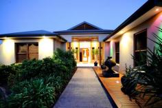 32 Glenabbey Dr Dubbo NSW 2830 Auction 06/11/2014 at 6:00 PM Property: House Bldg: Cement Rendered Land: 2525 Sqm Council: Dubbo Pool: Yes Age: 9 Rooms: Lounge/Living Office Rumpus Room Family Room Dining Room Other Areas: Laundry Area- Internal Formal Entry Walk-in-Pantry Courtyard Complex: Barbecue Area Furnished: N Majestic Family Home with Scenic Views Positioned in prestigious Kintyre Estate offering beautiful panoramic views over Dubbo and the Harvey Ranges, this luxurious property with grand proportions is nestled on a peaceful 2,525 sq m block (approx). The sheer vastness of the family home is immediately impressive with a collection of three living areas, four generous sized bedrooms plus office or fifth bedroom and large elevated entertaining patio overlooking the solar heated inground pool. If you are looking for a lifestyle that affords living without compromise, you must simply inspect this property. Features: - Four oversized bedrooms - Stunning master retreat includes dressing room/walk-in robe and beautiful ensuite - Office or fifth bedroom - Lavishly appointed bathroom - Centrepiece formal lounge room with magical views - High gloss kitchen overlooking the family and dining areas with vaulted ceiling and views - Huge downstairs games room with impressive bar/kitchenette and third bathroom - Laundry offering loads of storage - Zoned, ducted reverse cycle air conditioning - Natural gas points - North East facing, elevated entertainers patio with superb views - Inground, solar heated pool with entertaining terrace - Landscaped yard providing privacy and including rear utilities storage and fire pit area - Three car garage with auto doors (one bay currently fitted with storage shelving) - Built by Rod Dunkley and hand picked tradesmen - Town water, tank water, town sewer, underground 3-phase power available - Peaceful retreat on a 2,525 sq m (approx) parcel - Elevated views over Dubbo, Harvey Ranges and zoo - Short drive to Dubbo Golf Course, cycleway, private and public schools, Delroy Park Shopping Centre, Woolworths Supermarket and CBD amenities The information and figures contained in this material is supplied by the vendor and is unverified.Potential buyers should take all steps necessary to satisfy themselves regarding the information contained herein.