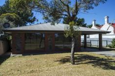 16A Richards St Goolwa SA 5214 $275,000
This Deceased Estate property is in need of some good old fashioned
'work'. Roll your sleeves up, put your gloves on and give her the tender
love and care she deserves! This brick veneer home is set on a
fantastic allotment of approximately 1,000 sqm of land, opposite a
reserve, walking distance to the main street and river! Could be
converted back into something very special! A place to call 'home'. Entry
into the open plan living / dining / kitchen. A neat little country
style kitchen with timber cupboards, breakfast bar, electric oven and
slate tiled floors with adjoining dining. Lounge overlooking
front of the home, with gas point for heating. You will need a good
fresh coat of paint on all the walls, new curtains and new carpet
throughout. Passage leads to the 2 bedrooms. Both good sized. Main with Ceiling fan. Bathroom
with shower and an old vanity, that you will probably want to replace,
but all in all in pretty good condition. Separate WC alongside the
laundry with linen cupboards. Off the rear verandah there is an enclosed room, ideal for a teenage retreat or games room for the kids. Single
garage under main roof, with front and rear roller doors. Side gate
access to large rear yard with a huge shed with concrete floor at the
rear. Plenty of room for all the toys!