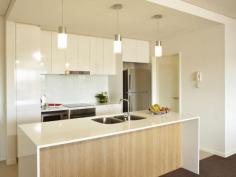 50/55 Gardugarli Drive Baynton WA 6714 Blue-chip lease / Secure return Secure this exclusive 2 bedroom, 2 bathroom apartment with a lease in place until October 2014 and start earning positive cashflow from day one! Situated in a secure and quiet location, in Karratha’s most desirable suburb of Baynton West, these high-end apartments are sure to remain highly sought after by the corporate leasing market The one of a kind complex has an intimate, welcoming feel, while simultaneously offering a vibrant sense of activity featuring fantastic facilities including a stunning below ground pool, gym and barbeque entertaining area. Features Include: • Spacious 2 bedroom, 2 bathroom apartment • Current lease in place at $1,150/ week until October 2014 • High-end quality finishes throughout • Integrated living, dining and kitchen space • Generous balcony and lockable storage room • Allocated undercover parking • Situated next to family facilities, public library and sports field • Close to airport and central amenities • 3 bedroom 2 bathroom and penthouse configurations also available Contact us now to schedule your free consultation with one of our expert team members. General Features Property Type: Apartment Bedrooms: 2 Bathrooms: 2 Indoor Features Toilets: 2 Outdoor Features Open Car Spaces: 2 Balcony Under Contract