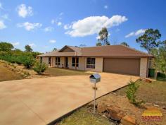 104 Anne Collins Crescent Mundoolun Qld 4285 $440,000 HIGH COUNTRY BARGAIN ON 1.2 ACRE'S 4 Bedrooms + Ensuite Looking for the ultimate bargain in the best area? Then look no further. This, large, hilltop 4 bedroom home is ready and waiting. • Quality Construction • 4 Large Bedrooms • 2 Big living areas • Dining • Modern Kitchen • Air-con • Big alfresco area • 2 Bathrooms • Double garage • Stainless appliances • Fully Screened (‘Crimsafe’ doors) • Huge workshop or storage area in garage • Just under 1.25 acres (4957sq.m) • Corner block • Immaculately presented Perched high on a hill with views and breezes in abundance. CLICK ON ANY PICTURE TO ENLARGE The Mundoolun Estate has Over 300 Acres purely dedicated to Wildlife Corridors and Parklands, and is well known for its quality of housing. Each Acreage Property has Town Water, Underground Power & Phone, and Tree lined Kerb & Channelled roads. Just a short drive to the thriving Jimboomba town centre; there you’ll find a fine array of Shops & Café’s including Woolworth’s, Coles, Bakers Delight, Mitre 10, the Post Office, Takeaways and much much more. Only 45 minutes to both Brisbane and the Coast. For an inspection please call (07) 5546 9093 PROPERTY INFORMATION Area: 4957 Square Meters Bedrooms: 4 Bathrooms: 2 Garage Spaces: 2