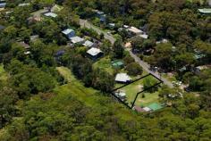33 Brighton St Bundeena NSW 2230
If You've Got The Vision, We've Got The Land
There's room enough to build the castle of your dreams on this lovely large level block. Lush
bushland provides a green and pleasant backdrop to 850sqm of endless
possibilities. While you draw up your designs, you can use the existing
huge double garage to store your boat and beach toys, while the ample
rainwater tank is ideal for washing off the sand and making an early
start on that veggie patch. Walking distance to shops, school
and transport, this peaceful spot is a pleasant stroll to gorgeous
Horderns Beach, but enjoys the privacy of sought-after cul-de-sac
positioning. Ready-to-build properties are few and far between in this area, so it could be time to let loose your inner architect.