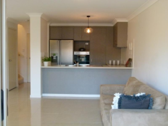 14/17 Lather Street Southport QLD 4215 Privately located at the rear of a secure building, the apartment opens to huge open plan kitchen, living and and family room; flowing onto a large covered outdoor entertainment area. The new kitchen features: New modern quality kitchen and range hood Large pantry Dishwasher Ample bench and cupboard space The open plan kitchen, living and dining areas are large enough for a family. Massive storage cupboard located near the entry. New air conditioning unit. Beautiful sea breezes naturally cool the entire apartment. The laundry boasts good space and generous storage cupboards