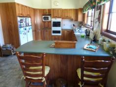 1 Laheys Creek Road Dunedoo NSW 2844 "Warwick Farm" Approximately 145 Acres (58ha) UNRESTRICTED FREEHOLD. Situated Approx. 20 km South Dunedoo, 70km Mudgee, 100km Dubbo - 4.5 hours' drive to Sydney. Privately positioned with excellent views over the fertile Tucklan Valley famous for its Red Basalt Soils and Kurrajong trees. Substantially renovated four bedroom homestead with modern kitchen, casual living, formal lounge and dining, large enclosed entertaining area with tiled floor, office plus separate double garage, all surrounded by well-maintained gardens and high standard improvements. Climate controlled living, kitchen, lounge and main bedroom. Well balanced soils with opportunities for further cultivation, continued pasture improvement and natural grazing. Currently used in the fattening of livestock, both cattle and sheep.Excellent fencing, steel posts and hinge joint, electric two standard shearing shed, steel sheep yards, cattle yards with approximately 80 head capacity. 450 bag flat bottom silo, plus storage shed. Water includes 2x 10,000 litre tanks with equipped bore, approx. 1800L/hour. A unique opportunity to purchase a rare offering, perfectly located within easy reach of major centres. Enjoy the rural lifestyle with all that this property and comfortable homestead has to offer. Access to school bus to Dunedoo for primary and secondary education. Further potential for development into various opportunities including horse or cattle stud. Property Features Property ID 11367583