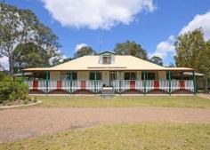 86 Castles Rd South Craignish Qld 4655 * verandahs all round * 1 kva solar power * 2 x tandem carports off house * 9x6m colorbond garage in back yard * 2 acres with town water * a/c living areas * new guinea rosewood kitchen, with gas cooktop and gas wall oven * 3 bedrooms down stairs and 1 bedroom and office upstairs * living areas and beds 1 & 2 open onto verandahs * property overlooks golf course * rates 1700 P/A water $500 P/A Nestled on 2 very private acres overlooking the golf course this renovated queenslander style home represents real Queensland living, boasting sprawling verandahs that wrap around the entire home to ensure you can always capture a breeze whilst sitting back and enjoying nature or the golf. This well cared for home offers 4 large bedrooms, 3 downstairs and 1 upstairs, upstairs there is also an office or utility room. Of the 3 downstairs rooms, 2 offer access onto the verandahs whilst the main also has an ensuite. The kitchen is finished in stunning New Guinea rosewood and is a delight to work in, the cook top and wall oven are gas ensuring you can cook if the power goes out and of course there is storage galore. The air conditioned dining room overlooks the kitchen and leads out to the verandah. The large family/lounge area is also air conditined and offers enough room for the largest of family gatherings. For the vehicles there is a tandem carport on either side of the house as well as a 9x6 m color bond shed. The block is fenced on 3 sides and would be the ideal setting for a couple of family farm pets. Phone Realway Property Consultants today on 0741284255 to arrange your personal inspection.