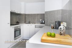 50/63 Ainslie Avenue Braddon ACT 2612 The Gatsby Conveniently located within a 5 minute walk of the Canberra Centre and situated on the first floor of the popular Gatsby development this immaculately presented 1 bedroom apartment boasts 73.5m2 of living area and combined 16m2 of outdoor living space. The fabulous northerly aspected living opens via sliding doors onto a covered balcony which overlooks a tranquil beautifully landscaped common area, away from the hustle and bustle of busy streets. The modern kitchen features, beautiful natural stone bench tops, Miele stainless steel appliances and copious storage whilst the spacious modern bathroom has access from both the bedroom and living areas giving occupants the convenience of an ensuite. The bedroom features its own private balcony which opens to allow a beautiful cross draft through the apartment whilst the living area features ducted reverse cycle heating and cooling. Additionally the apartment features intercom, lift access, basement parking and a storage locker. - North facing - 73.5m2 of living - Security intercom - Reverse cycle ducted heating and cooling - Balconies - Secure basement parking General Features Property Type: Apartment Bedrooms: 1 Bathrooms: 1 Eco Friendly Features EER (Energy Efficiency Rating): Medium (6.0) $399,950