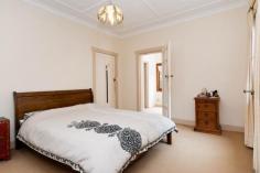 9/26 Kidman Street Coogee NSW 2034 Located in the heart of Coogee this unique apartment is brimming with character. The high ornate ceilings provide a sense of space while wood framed doors & windows enhance the property’s Art Deco period charm. The practical design incorporates a separate entrance in the kitchen through which residents can access the rear yard with ease. Accommodation includes an enormous master bedroom that includes a built-in wardrobe and a second bedroom or study accessed via the main bedroom or lounge. Positioned away from the main street the apartment has no common walls for added peace and quiet. The location is convenient to local shops and transport routes and within walking distance to the beach. This property is an affordable option for the first home buyer and the popularity of the location means that investors can be assured of minimal vacancy rates between tenancies.