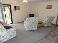 AFFORDABLY YOURS IN A GOOD LOCATION
Situated in a small unit community sits this attractive 2 bedroom
brick Unit with rear lane access. You will appreciate the reasonable
sized side and rear fenced yard with a stamp concrete pergola area to
relax on + lockup storage cupboard. The unit consists of single
carport with adjacent entertaining area, 2 good sized bedrooms both with
built-in robes, generous sized open plan kitchen / Dining and lounge
area. There are also a reverse cycle air-conditioner unit in the living
area + ducted evaporative air-conditioning. Ring now to book your private inspection.