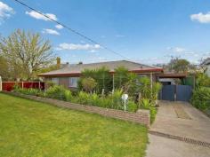 7A Cambridge Crescent White Hills VIC 3550 Tucked away off the main road yet only minutes from the CBD and convenient to all amenities, this three-bedroom brick-veneer home is an excellent buy. Primary and secondary schools, a post office, chemist and other shops are all close by and there's a bus route on Napier Street. It would suit a range of buyers from a professional couple, to downsizers, investors and first home buyers. Double gates on the driveway open to a single carport, while further in, there's a large shed with a concrete floor and power. From
the verandah, a front door opens to a good-size lounge room which has a
wall-mounted air-conditioner. Through a wide opening is a kitchen and
dining area with a suede-finish feature wall. The kitchen has an upright
gas stove, and plenty of storage space above and below the benchtops. A
hallway extends from the kitchen to the three bedrooms. All have
built-in wardrobes and ceiling fans while one has a wall-mounted
air-conditioner. Ducted heating is throughout the home as well. Also
along the hallway are two-door linen storage, a four-piece bathroom and a
laundry that opens to an outside ramp, under a second verandah, leading
to the back garden. A garden shed with a concrete floor is another
addition in the low-maintenance back garden where a number of fruit
trees are happily growing, including apple, peach and apricot. This is a great opportunity to buy a well-priced home and make it your own.