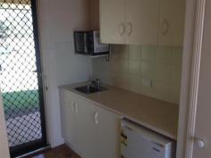 28/14 Fanny St, Newtown Qld 4350 Located close to all amenities including shops, school and parks. This unit is sure to be ideal for you! Walk into the tidy kitchen with a convection oven and a small fridge. Enjoy the large combined lounge and bedroom which is well presented with blinds, built-in desk, tv bracket to wall with an air conditioner and a ceiling fan to keep the home cosy all year round. The bathroom hosts shower and toilet whilst the laundry area is shared. Step out the large sliding door to a private fully fenced courtyard with security screens to the doors. Your outside pet is negotiable and the courtyard is to be maintained by tenant. BOND - is calculated at 4 times your weekly rent. No smoking is permitted inside. WATER - Tenants pay for no water consumption. PLEASE NOTE - You are not to enter the property grounds under any circumstances, unless accompanied by a RE/MAX Representative. FOR INSPECTIONS OR FURTHER DETAILS, PLEASE CONTACT OUR PROPERTY MANAGEMENT DEPARTMENT DIRECT ON (07) 4638 6115.