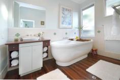 295 Agnes St The Range QLD 4700 $710,000 Tropical landscaped lawns and gardens surround this charming 4 bedroom, 2 bathroom home. This home is sure to delight and surprise all upon first inspection. Situated in highly sought after secluded Range position on 1764sqm fenced allotment this "family friendly" home has new kitchen and master bathroom with decks off both formal and informal living areas which are ideal for those whoe love to entertain. North East aspect with total privacy and position. Internal stairs lead down to double auto lock up car accommodation. Cubby house for the children and three bay insulated colorbond shed with power for the man in the family. Phone to inspect this immaculately presented home. - See more at: http://www.professionalsrockhampton.com.au/real-estate/property/755938/for-sale/house/qld/the-range-4700/295-agnes-street/#sthash.HeJXPnsx.dpuf