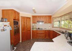 86 Castles Rd South Craignish Qld 4655 * verandahs all round * 1 kva solar power * 2 x tandem carports off house * 9x6m colorbond garage in back yard * 2 acres with town water * a/c living areas * new guinea rosewood kitchen, with gas cooktop and gas wall oven * 3 bedrooms down stairs and 1 bedroom and office upstairs * living areas and beds 1 & 2 open onto verandahs * property overlooks golf course * rates 1700 P/A water $500 P/A Nestled on 2 very private acres overlooking the golf course this renovated queenslander style home represents real Queensland living, boasting sprawling verandahs that wrap around the entire home to ensure you can always capture a breeze whilst sitting back and enjoying nature or the golf. This well cared for home offers 4 large bedrooms, 3 downstairs and 1 upstairs, upstairs there is also an office or utility room. Of the 3 downstairs rooms, 2 offer access onto the verandahs whilst the main also has an ensuite. The kitchen is finished in stunning New Guinea rosewood and is a delight to work in, the cook top and wall oven are gas ensuring you can cook if the power goes out and of course there is storage galore. The air conditioned dining room overlooks the kitchen and leads out to the verandah. The large family/lounge area is also air conditined and offers enough room for the largest of family gatherings. For the vehicles there is a tandem carport on either side of the house as well as a 9x6 m color bond shed. The block is fenced on 3 sides and would be the ideal setting for a couple of family farm pets. Phone Realway Property Consultants today on 0741284255 to arrange your personal inspection.