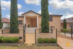 75 Macquarie St Greenacre NSW 2190 Fit For A King - DA approved for medical use!!!
An exceptional entry into arguably Greenacres most prestigious
locations, this quality built full brick home is set in a commanding
position and boasts stunning city views. Featuring an impressive floor
plan with sunlit formal lounge and dining and two separate family rooms,
four double bedrooms, main with ensuite and a total of four bathrooms,
high ceilings and stunning timber kitchen all finished to the highest
standard. This large family home ideally suits a large family with
double garage plus abundant storage space, sparkling in-ground pool,
alfresco terrace and two balconies. All set on a large and level 613m2
landscaped block close to shops and private schools. Also DA approved
for a medical use. Sure to impress – Inspection highly recommended.