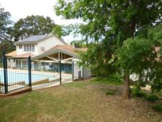 16 Molong Rd Parkes NSW 2870 Position & Prestige $650,000 If you are in the market for a quality home then this five bedroom beauty must be on top of your list. Situated in East Parkes on a 2047sqm block and surrounded by beautiful landscaped gardens this home is special. Five bedrooms, three bathrooms, lounge room, dining room, family room and study. The modern kitchen is spacious and well appointed with walk-in pantry and island bench with breakfast bar. The home has ducted evaporative a/c and natural gas heating while the master bedroom has reverse cycle split system. There are three attached lock up garages with internal access and lofts for storage, refrigerated cellar and a laundry with an abundance of storage. The yard features an in-ground saltwater pool, huge entertaining area with pitched roof, watering system throughout the yard and 5kw solar power.