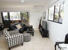 1/14-16 TE Peters Drive Broadbeach Waters Qld 4218 Live the inner city lifestyle in this funky modern apartment close to one of the Gold Coasts best cafes and award winning restaurants. Spacious combined living/dining areas, modern kitchen with stone bench tops, renovated bathrooms with ensuite off master bedroom. Custom built study nook in second bedroom and built in wardrobes in both bedrooms. Large tandem style garage with ample storage space. Notable features: - North facing sunny apartment - Modern 2 bedrooms, 2 bathrooms - Stone bench tops in kitchen - Timber bar top on balcony - Only eight in the building - Low Body Corporate - Large tandem garage - Walk to beach, cafes, restaurants Features Balcony, Smoke Alarms, Safety Switch. Property Details Bedrooms 2 Bathrooms 2 Garages 2 Agent Name: Trevor Groves Phone: 07 5592 1466 Mobile: 0409 579 823