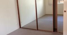 4/21-23 Wilga Street BURWOOD NSW 2134 Bright & spacious 2 bedroom unit in security complex. Spacious lounge and dining,timber kitchen, built in wardrobes in both bedrooms, Internal laundry, lock up garage and court yard. Located opposite Westfield's Shopping Centre only short stroll to station. RENT NEGOTIABLE!!!