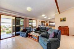 31 Linden Crescent Qunaba QLD 4670 This family home is a fantastic property with just so much warmth on the inside - certainly not able to be fully appreciated from the roadside. Featuring; big open family room, media room or private rumpus, three large built-in bedrooms (which are all air conditioned - master with new ensuite & walk-in robe), office nook, newly rendered & painted exterior, immaculate fixtures and fittings and all with a flowing design to take advantage of the superb location. The main living area is open with dining and kitchen all opening up onto the timber deck on which many good times have been had! With one owner from new, this property was built so that the whole home faces down the gently sloping 739sqm allotment to take in the scenic views of the gorgeous Bundaberg countryside allowing for entertaining all year round. There is a single lockup garage on the house with plenty of side access to the single shed, fenced yard and extra storage under the deck. Do not delay! There are many good times still to be had here and next to no maintenance moving forward.