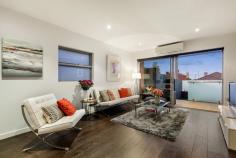 1/165 Clarke Street Northcote VIC 3070 Pure Class Offering a brilliant cosmopolitan lifestyle within moments of vibrant High Street, this modern two bedroom apartment is a sophisticated standout. Immaculate and open, the living/dining/kitchen showcases high quality appointments, including Neff appliances and stone surfaces, and leads through a sliding glass door to a covered patio and gorgeous sun-drenched courtyard. Bedrooms have mirrored built-in robes and panel heaters, and there is a chic bathroom, plus a neatly concealed laundry and separate storage room. Further features include split system heating and cooling, a video intercom and secure covered parking. A quick commute from the city and just an easy walk to trams, trains, schools and the trendy establishments of High Street, including Westgarth Cinema, it's the perfect base to enjoy life. General Features Property Type: Apartment Bedrooms: 2 Bathrooms: 1 Indoor Features Toilets: 1 Outdoor Features Carport Spaces: 1
