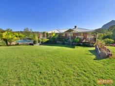 14 Stockman Court, Pomona QLD 4568 Located at the top end of a peaceful and private cul-de-sac. Set high with magnificent views of Mt Cooroora and the 1.7 acres of lawns and gardens. Wrap around verandahs on 3 sides with a massive under cover entertainment area. 5 bedrooms and 3 bathrooms. 3 separate living areas. 2 pac kitchen with dishwasher & breakfast bar. Open plan kitchen and living room with ducted slow combustion fire place opens onto the front and rear verandahs.