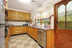 17 Alvena Crescent Heathmont VIC 3135 $500,000+ TWILIGHT AUCTION Thursday 13th November at 7pm. Picture-perfect
presentation; welcoming, warm and comfortable interiors and a superbly
convenient and leafy Heathmont location delivers this impeccably
maintained, circa 1955 'one-owner' residence. Poised upon a
favoured corner allotment of 661sqm (approx.) (with entry via Royal
Avenue), this enchanting weatherboard retains the classic touches and
charm from yesteryear complemented with modern appointments; screened
privately behind lush and manicured gardens, this delightful home will
immediately captivate. Inviting interiors offer a substantial
lounge with north-facing windows saturating with natural light, and high
ceilings featuring ornate ceiling roses and decorative cornice,
enhancing the sense of space. Adding further appeal, this engaging abode
also enjoys a second generous living and dining area ensuring familial
harmony. A sizeable meals domain with modern feature wall, is
overseen practically by the solid timber kitchen resplendent with
plentiful granite surfaces, a large bay window, quality appliances
including a stainless-steel dual-drawer dishwasher as well as a plethora
of cabinetry. Accommodation is well met with three bedrooms, all
fitted with built-in robes and serviced by the tidy family bathroom and a
separate toilet. Further notable benefits include gas heating,
air-conditioning, quality window and floor coverings, undercover
alfresco and landscaped gardens, an inviting conservatory offering a
serene and sheltered space to enjoy the leafy outlook, a single garage
and a handy multi-purpose room under the home, ideal as a craft, hobby
or store room. Positioned prominently on a quiet, tightly held
crescent just moments to Heathmont railway and bustling shopping strip,
elite schools (Great Ryrie Primary, Aquinas College and Tintern
Grammar), playgrounds, Wombalano, Jubilee and Ringwood Lake Parks) as
well as easy proximity to Eastland Shopping Centre and EastLink. Photo ID Required