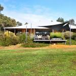 2035 Chittering Road Lower Chittering WA 6084 The desired location for luxury lifestyle with income an option Located in the stunning environment of the Chittering Valley, White Dog Farm, is a private retreat only 70 minutes form Perth CBD and 45 minutes to the Perth airport. Purchased for its location and aesthetically pleasing situation, the property has been developed with a focus on attention to detail and respect for the natural surrounds. String Bark Winery and Restaurant is walking distance and the attractions of the Chittering Valley on the doorstep, including wineries and renowned citrus farms. The Marbling Brook bisects the property which is a mix of natural bush and parkland cleared areas with establish eucalyptus. White Dog Farm is currently operated as a highly successful luxury guest accommodation destination, providing a balance of lifestyle and income options for the owner. The property can easily transform to a private estate should this be the desired situation. The main residence has a 'wow factor' with it's contemporary design, clever positioning and stunning interior design. Construction is of rammed earth and iron, with 3 metre verandahs on all sides. Attractive low maintenance landscaping surrounds the homestead an incorporates. General Features Property Type: Lifestyle Bedrooms: 7 Bathrooms: 6 Land Size: 17.00ha (42.01 acres) (approx) Price per acre: $47,132 Indoor Features Indoor Spa Study Floorboards Dishwasher Air Conditioning Open Fireplace Outdoor Features Carport Spaces: 3 Garage Spaces: 3 Outdoor Entertaining Area Fully Fenced Outside Spa Eco Friendly Features Solar Panels Solar Hot Water Water Tank $1,980,000