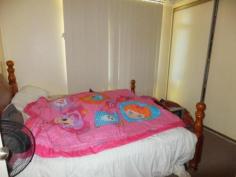 4 KEELEY STREET Childers QLD 4660 For Sale $330,000 * 2 x 2 bedroom falts * 11762m level block * Close to shops, schools etc * One flat has a new kitchen, bathroom and tiled living areas the other is unrenovated * Ceiling fans in living areas plus main bedroom * Block is fenced * Car accommodation provided by a double carport * Both units currently tenanted