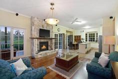 20-22 Kerry Road Warranwood VIC 3134 **** UNDER CONTRACT **** Tucked in an exclusive and infinitely peaceful pocket of Warranwood is this irresistible family home that immerses you in bushland vistas and beautiful birdsong. The spacious and welcoming interior is beautifully presented, featuring 3 living zones and easy indoor/outdoor flow to an immaculate landscaped garden. Adjoining the Candlebark Reserve provides a luxurious sense of space for this impeccable home ? built with family life in mind. - Attractive brick home set amid leafy landscaped gardens in park side location - Granite kitchen with 900mm s/steel cooker, Asko dishwasher, and bay window - Open kitchen/meals/family zone warmed by a gas log fire, with bay window and deck access - The elegant lounge enjoys a Victorian open fireplace and adjoining dining room - The spacious rumpus with timber flooring leads to the pretty rear garden - Master bedroom boasts walk thru robe to bright ensuite bathroom - A study and well appointed laundry complete the home?s interior - Features include ducted heating/refrigerative air conditioning, ducted vacuum, intercom, and powered under house workshop/storage - A large rear deck overlooks the Candlebark . General Features Property Type: House Bedrooms: 4 Bathrooms: 3 Land Size: 1995 m² (approx) Indoor Features Study Outdoor Features Garage Spaces: 2 $890,000 - $1,030,000