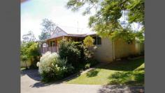 13-15 Ada Cres Upper Caboolture QLD 4510 QUALITY HOME ON 3000m2 IN BOUTIQUE PARK RESIDENTIAL ESTATE (A452) Located on a gentle sloping block with 2 street frontage in a lovely boutique park residential estate is this delightful property ideal for a growing family or a retired couple. The upper level is accessed at street level and features your main living area. There is a spacious open plan living room with high vaulted ceilings. This has direct access to 2 wide verandahs which wrap around 2 sides of the home. Here you have a choice of relaxing and entertaining indoors or outdoors with both options offering views of a manicured yard and across to the surrounding countryside and mountains. The kitchen has similar views. There are three bedrooms all with built in robes, the main has an ensuite. The lower level has a double garage, a study/utility/workshop with telephone line and heaps of storage space. There is three phase power and a built-in compressor will stay. Other great features include: Solar Hot Water. Wood heater in living area. Laundry at upper or lower level. 9m x 6m colorbond shed with power. 2 water tanks. Bush house, orchard including bananas, nut tree and citrus varieties. General Features Property Type: House Bedrooms: 3 Bathrooms: 2 Land Size: 3000 m² (approx) Indoor Features Toilets: 2 Outdoor Features Garage Spaces: 4