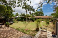 67-69 New City Road, MULLUMBIMBY NSW 2482 If you are a first time buyer,investor, downsizer or empty nester
seeking space, privacy, and low cost living within walking distance to
town, then 67-69 New City Road should tick all the boxes.
This spacious 3 bedroom, 2 bathroom home on a 1,152sqm sunny block in Mullumbimby presents a rare opportunity to acquire the
largest remaining block with front and rear lane access on this quiet street.
3 double sized bedrooms (2 with built in robes), will give you room for
the growing family, extended family or occasional guests, whilst a large
insulated garage at the rear of the property could be used for a home
studio/office/art space, kids retreat or, with Council approval, be
converted to income producing granny flat accommodation.
The tiled, low maintenance home is well laid out and very accessible.
There is an open plan kitchen and lounge that leads onto a large rear
terrace/courtyard, ideal for entertaining. The courtyard benefits from a
covered pergola and floor to ceiling bistro blinds that allow year
round outdoor living.